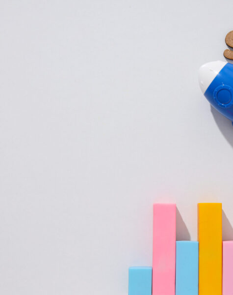 Diagram, letters and toy rocket on light background, space for text